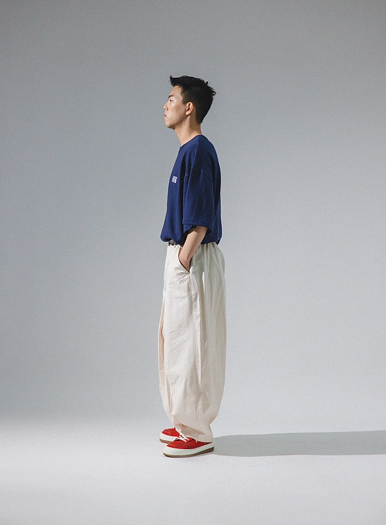 Брюки ANGLAN Unbalance Long Tuck Balloon Pants Ivory