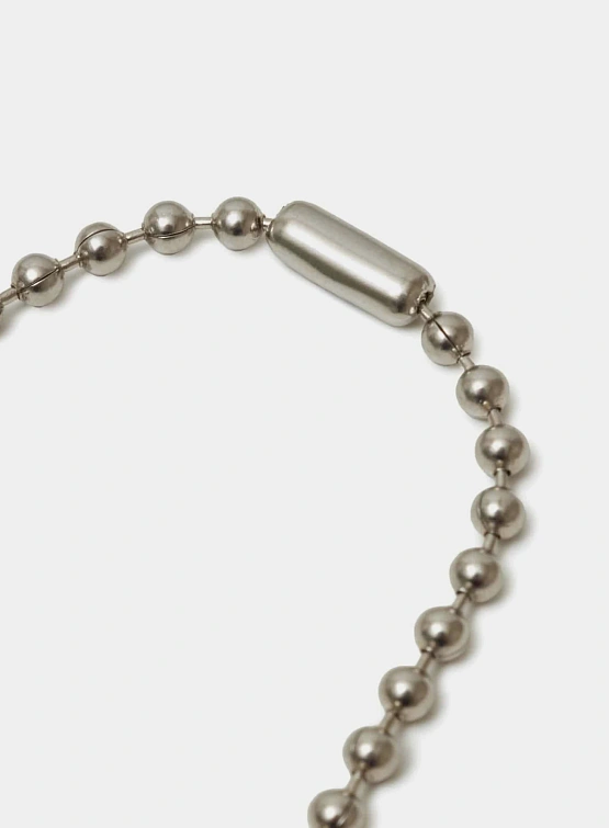 Ожерелье UNDERCOVER Brass Ball Laser Engraved Logo Charm Silver